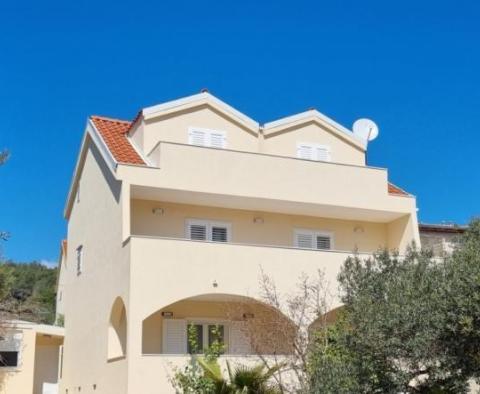 Three story villa with swimming pool, garden and auxiliary object in Starigrad, Hvar island 