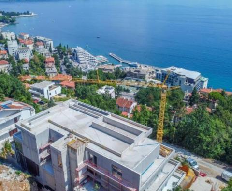 Gorgeous apartment of 239 sq.m. with private pool above the center of Opatija in an exclusive new building, garage, with sea view! 