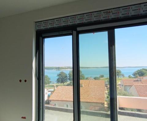 Apartment on the ground floor of a new building 100 meters from the beach, view, terrace, parking - popular Medulin - pic 17