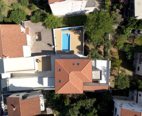 Apart-villa of 5 apartments first row to the sea in Selce 