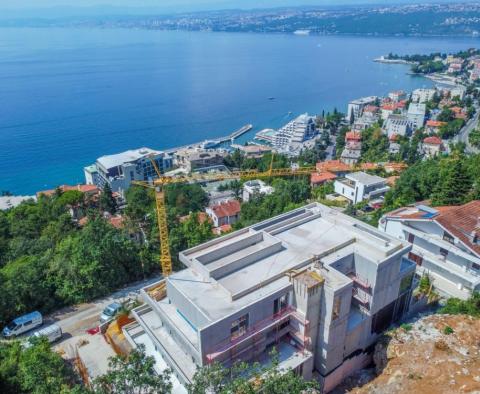 Luxury apartment of 137m2 with private pool in a new building above the center of Opatija, with garage and sea view - pic 5
