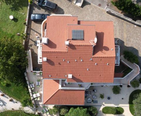 Mehrfamilienhaus von 700 m2 mit Schwimmbad in Lovran + 6000 m2 Grundstück mit einem Projekt für ein Wellness-Resort mit 28 Zimmern - foto 11