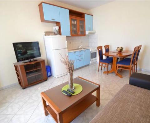 Apart-house of 4 apartments on the 1st line to the sea in Zadar area, right by the sandy beach - pic 19