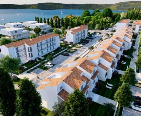 One-bedroom apartment with a garden in a luxury resort 100 m from the sea near Zadar! 