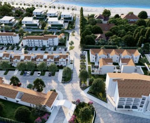 Nové luxusní apartmány v 5***** resortu u pláže nedaleko Zadaru s 4-6% výnosem z pronájmu 