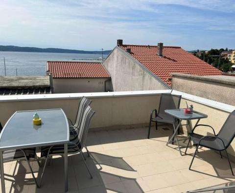 Apart-house with 4 apartments 30 meters from the sea in Selce, Crikvenica riviera 