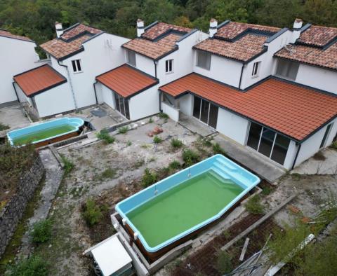 Пять рядных домов площадью 590 м2 с видом на море и 2 бассейнами в Ичичи - фото 5