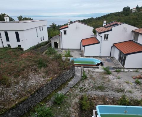 Пять рядных домов площадью 590 м2 с видом на море и 2 бассейнами в Ичичи - фото 9