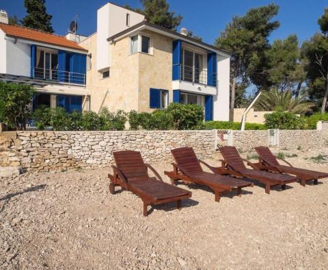 Unique property with two swimming pools first line to the sea in Supetar, island of Brac 