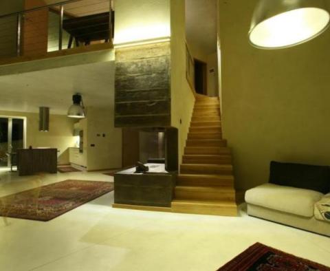 An extraordinary design villa with a swimming pool in an exceptional location in Motovun area - pic 45