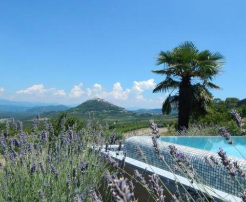 An extraordinary design villa with a swimming pool in an exceptional location in Motovun area - pic 60