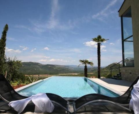 An extraordinary design villa with a swimming pool in an exceptional location in Motovun area - pic 68
