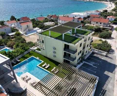 New apartments in Sevid in exclusive residence with pool by the sea, 100m from the beach 