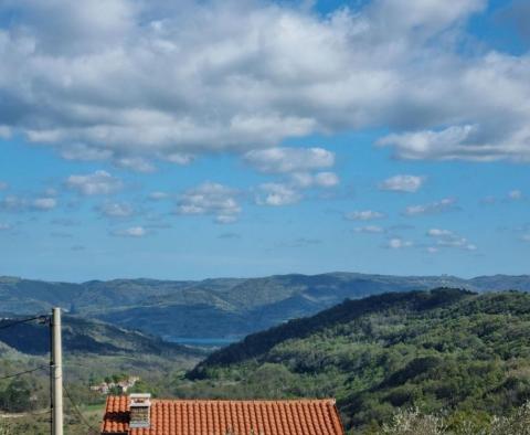 Fantastic estate in Buzet with 4 residential buildings and one business-residential building, open view of nature and the lake - pic 39