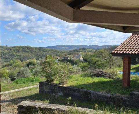 Fantastic estate in Buzet with 4 residential buildings and one business-residential building, open view of nature and the lake - pic 96