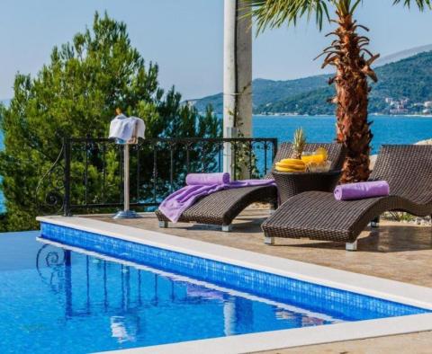 Luxury villa on the 1st row to the sea opposite high class marina 