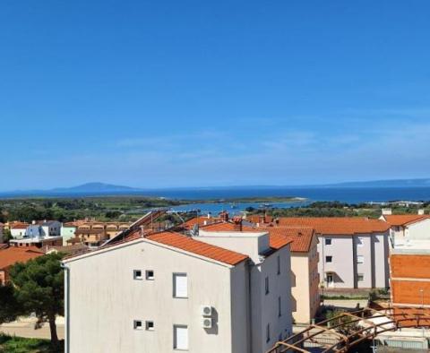 Two-story apartment with a panoramic sea view in Liznjan - pic 13