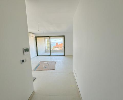 New stunning apartment of 64m2 in a new building, 200 meters from the beach and the center of Opatija with a garage! - pic 14