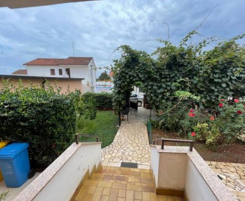 Cheap house for sale, with garden and garage in a quiet part of the village of Valbandon 