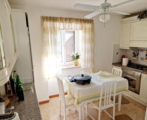 Two-bedroom apartment with small garden, summer kitchen and parking space - pic 7