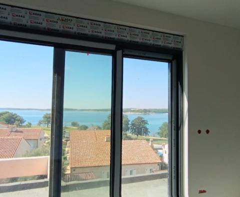 Apartment of 72m2 on the ground floor of a new complex in Medulin, 100m from the sea, view, terrace - pic 17