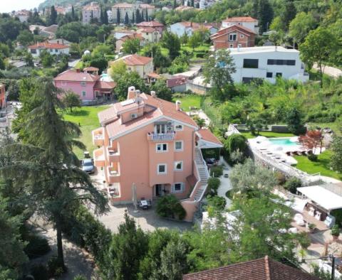 Apartment building of 700m2 with a swimming pool in Lovran + 6000m2 of land with a project for a wellness resort with 28 rooms - pic 12