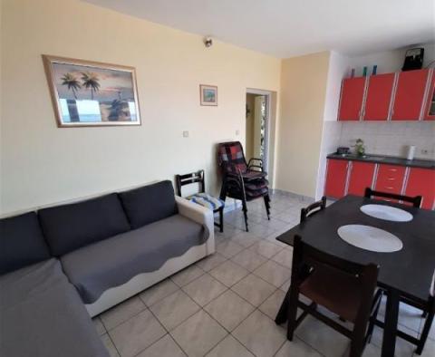 Semi-detached house with sea views in Seget Vranjica, with three apartments - pic 17