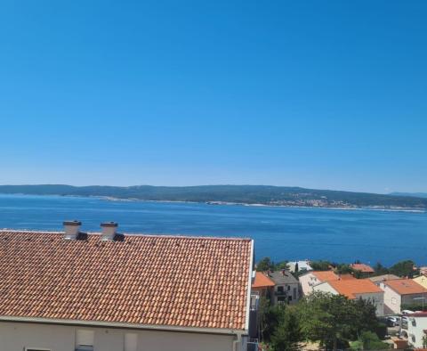 Apartment in a new building with a sea view in Crikvenica, 350m from the sea, for sale 