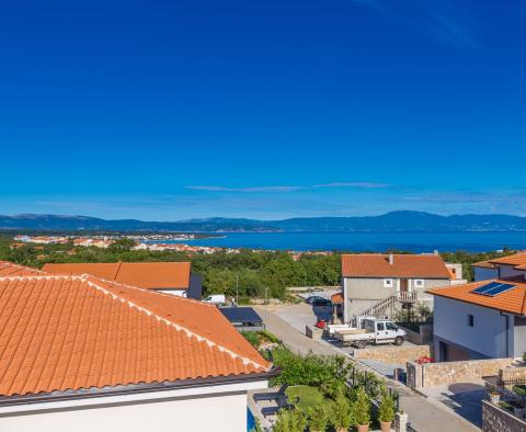 Two-story apartment with a panoramic view of the sea in Malinska for sale 