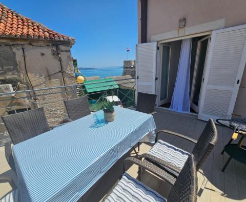 Wonderful apartment with 3 bedrooms  in Kastel Stafilic, 1st row to the sea, for sale 