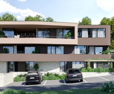 Grundstück mit Baugenehmigung für Luxuskomplex von Wohnungen in Rabac, zu verkaufen 