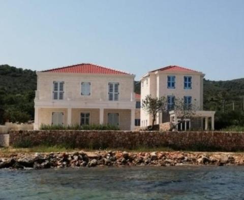 Waterfront stone villa on an island near Zadar with private access to the beach 