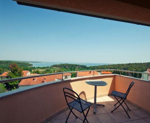 Apartment house of 13 apartments in Premantura with wonderful sea views, close to Kamenjak! 