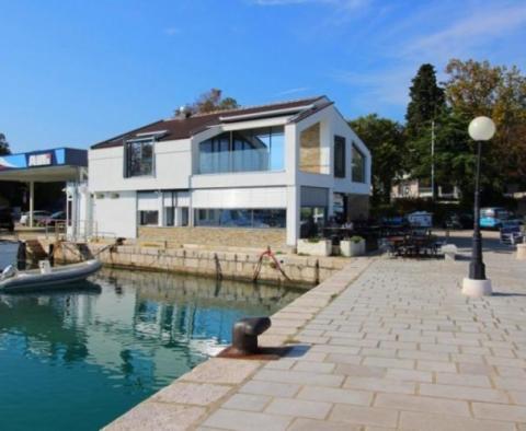 Seafront building with restaurant on Crikvenica riviera next to luxury marina 