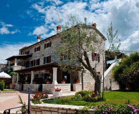 Beautiful old stone remodelled villa in Kurili, Kanfanar which offers restaurant, 7 apartments and four deluxe rooms 