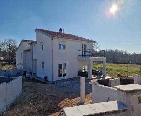 Two villas with a shared swimming pool in Bonaci, Porec area 