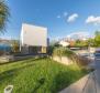 Une villa moderne avec piscines intérieure et extérieure sur la péninsule de Ciovo - pic 15