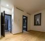 Wohnung in einem Neubau mit wunderschöner Aussicht, 200 Meter vom Meer entfernt im Zentrum von Opatija, zu verkaufen - foto 10