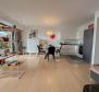 Bel appartement avec terrasse et place de garage offrant une vue fantastique sur la mer, piscine, à Opatija, à vendre - pic 9