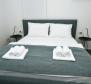Exklusive Wohnung mit 3 Schlafzimmern, nur 50 m vom Meer in Lovran, zu verkaufen - foto 9