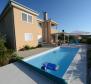 Nice villa of two apartments just 100 meters from the sea in popular and friendly Petrcane! 