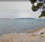 Building land plot 100 meters from the sea in Kastela 