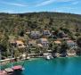 Attractive apart-house with 4 apartments for sale in Bobovisce on Brac, second row to the sea 