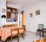 Attractive apart-house with 4 apartments for sale in Bobovisce on Brac, second row to the sea - pic 8