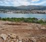 Land plot on Ciovo with building permit for new modern villa, just 170 meters from wateredge 