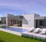 Modern single-story house with swimming pool in Tinjan under construction 
