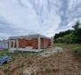 Villa of two parts under construction in Porec suburbs with distant sea views 