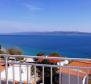 Self-standing apart-house of 4 apartments in Baska Voda just a few meters from the beach 