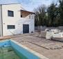 New semi-detached villa with swimming pool only 400 meters from the sea 