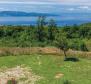 Urban land in Rabac area with sea views 